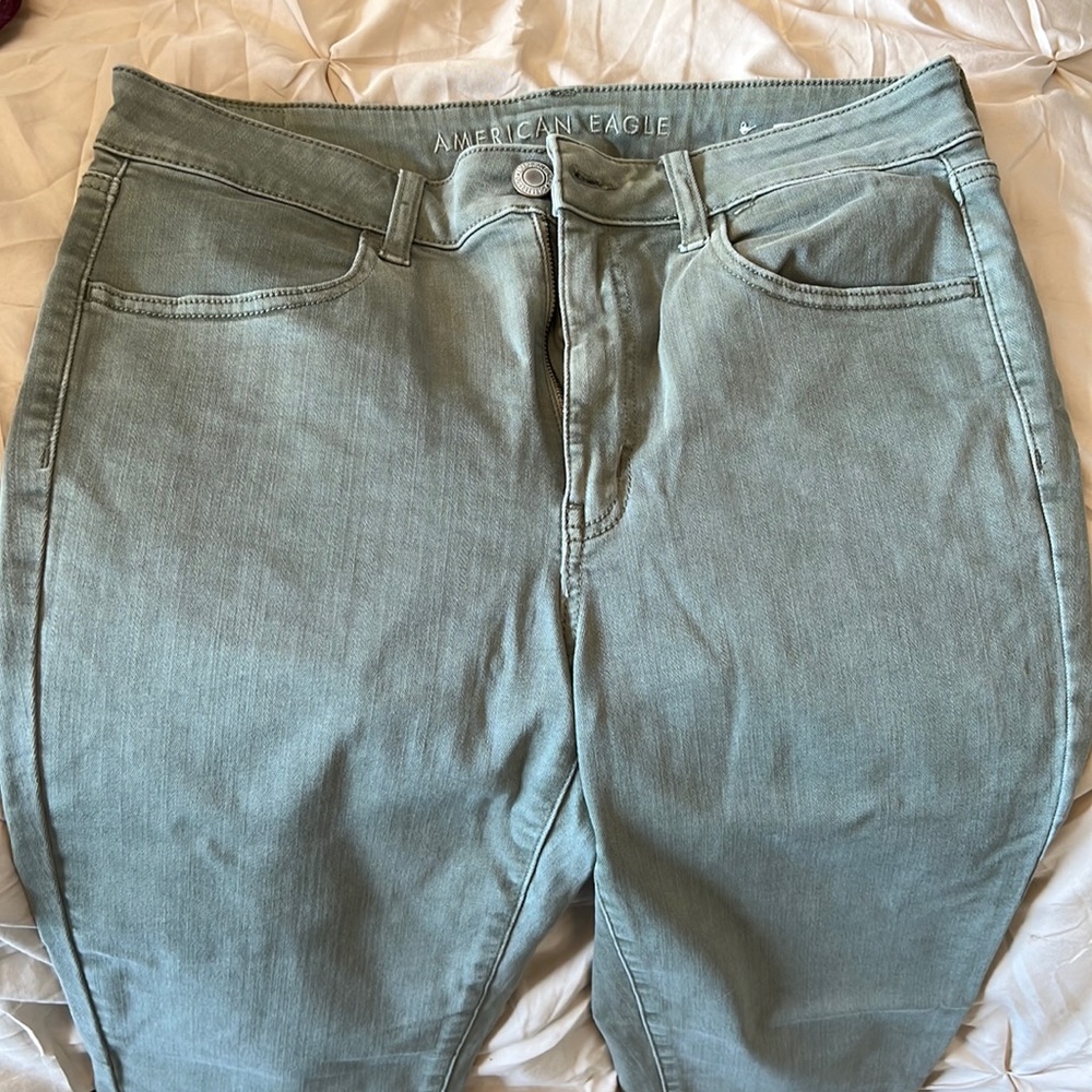 American Eagle sage green skinny jeans